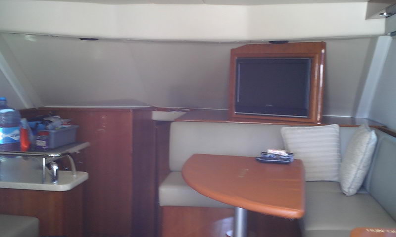 Riviera 43 fishing yacht cockpit with fighting chair and outriggers for sailfish marlin