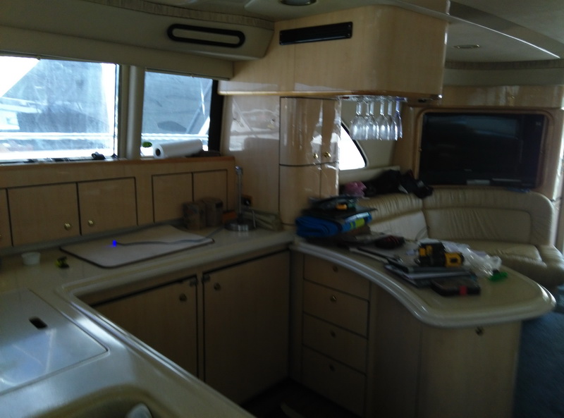 Spacious aft deck of the Sea Ray 55 set up for a family day tour from Cozumel