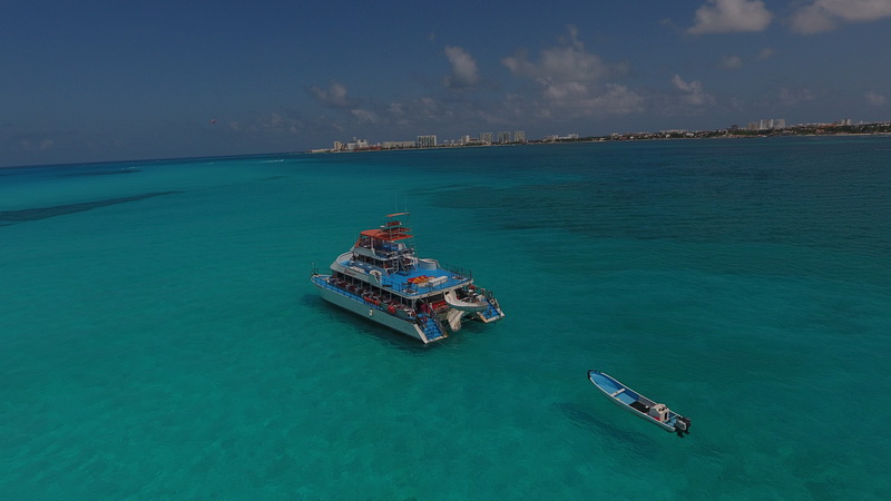 Dancer Catamaran party Cancun Isla Mujeres Day and Night boa…