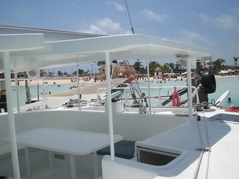 Catamaran moored at Puerto Aventuras marina Riviera Maya luxury sailing rental