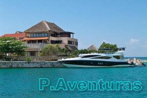 Sport yachts and sport-fishing boats lining the Puerto Aventuras marina, a large Riviera Maya fleet halfway between Cancun and Tulum