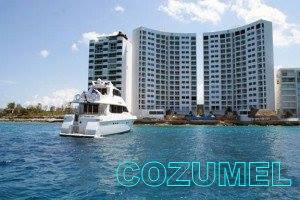 Snorkel, dive and fishing boats at a Cozumel marina above the world's second largest reef in the turquoise Caribbean