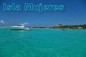 Sailing catamarans and yachts moored at Isla Mujeres marina, minutes from the turquoise sandbars and reef of the Mexican Caribbean