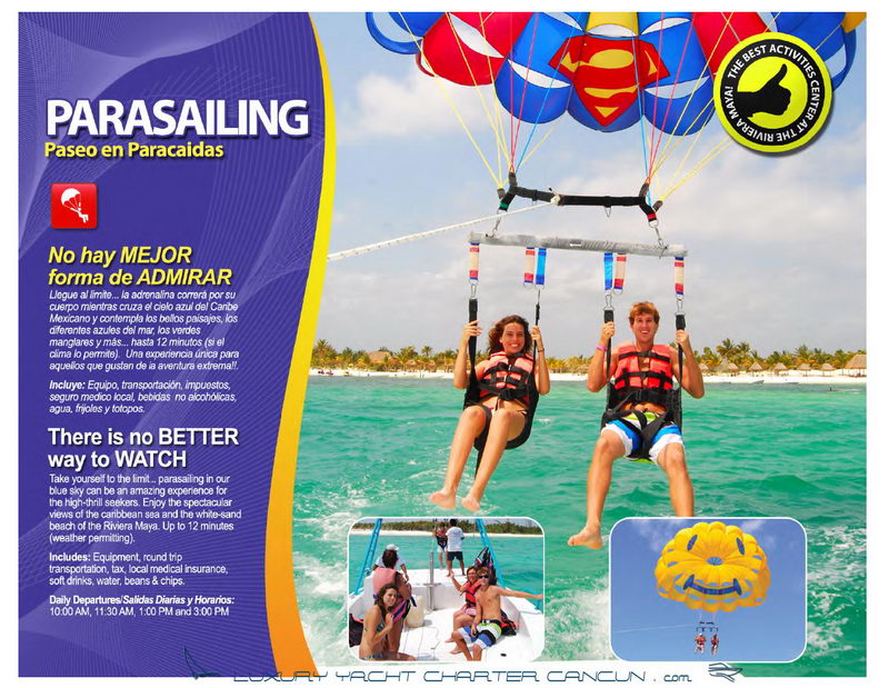 Parasailer lifted high above the turquoise water of Maroma Beach under a wide parachute on a Riviera Maya parasailing tour