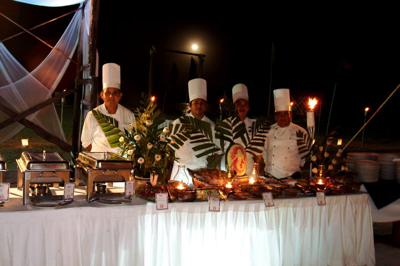 Beach dinner setup for an incentive group on the sand at Maroma, Riviera Maya, at sunset