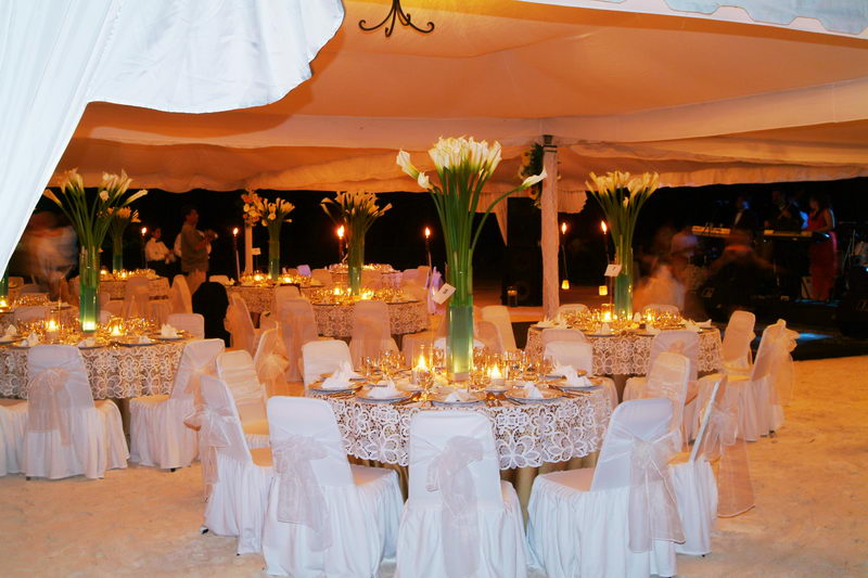 Long banquet table set on Maroma beach for a group celebration, Riviera Maya