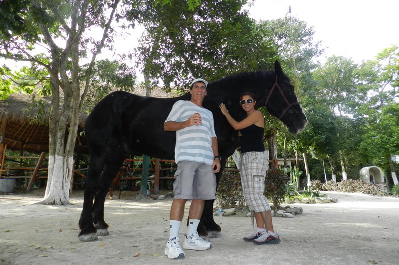 Beach horseback riding experience at Maroma, Riviera Maya, with white sand and blue sea
