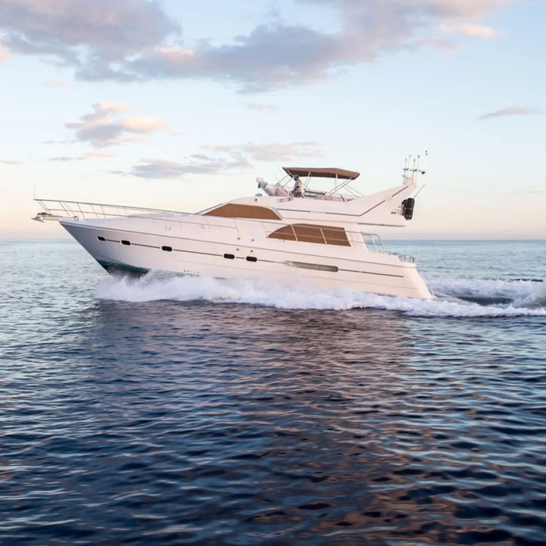 60 ft Azimut yacht deck and flybridge view — 360-degree Caribbean panorama toward Tulum