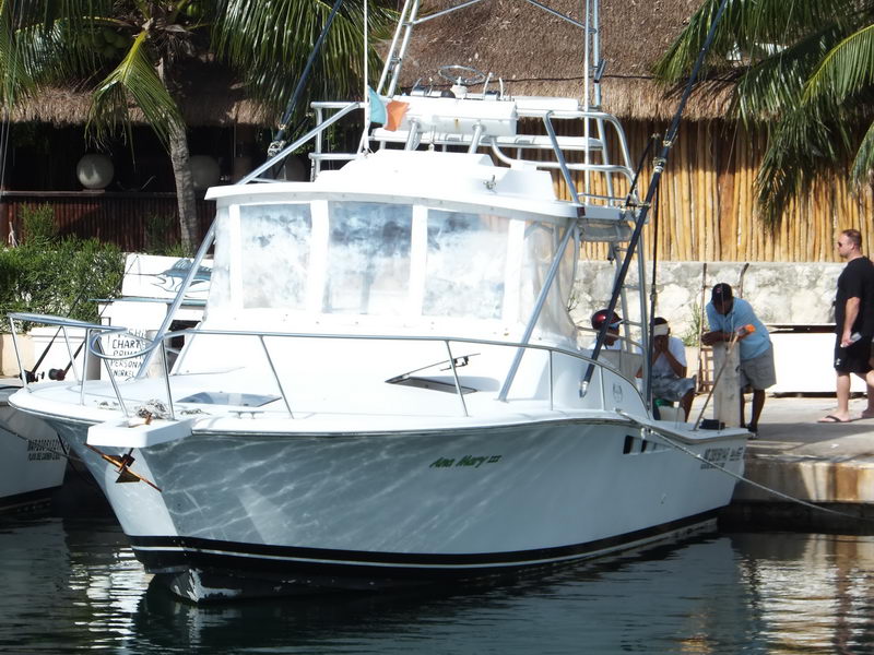 Ana Mary III 32 ft sport fishing boat docked at Puerto Aventuras marina Playa del Carmen Caribbean charter