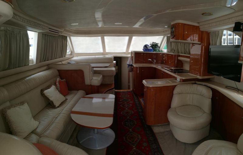 Sea Ray Sundancer 50 ft flybridge helm station twin Caterpillar engines private tour Cancun
