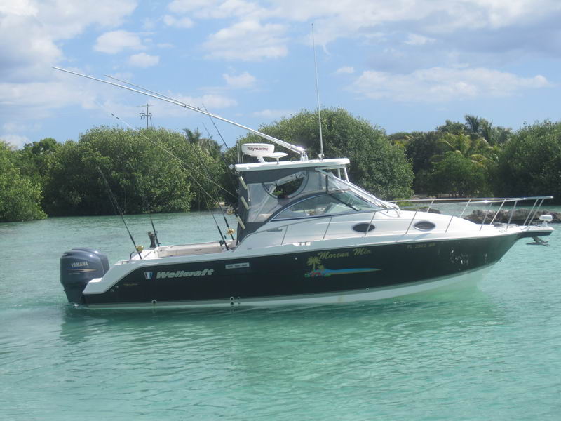 fishing charter boat with Raymarine electronics docked at Puerto Aventuras marina Riviera Maya